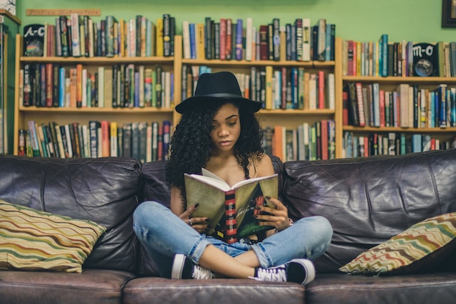 Girl reading on the couch